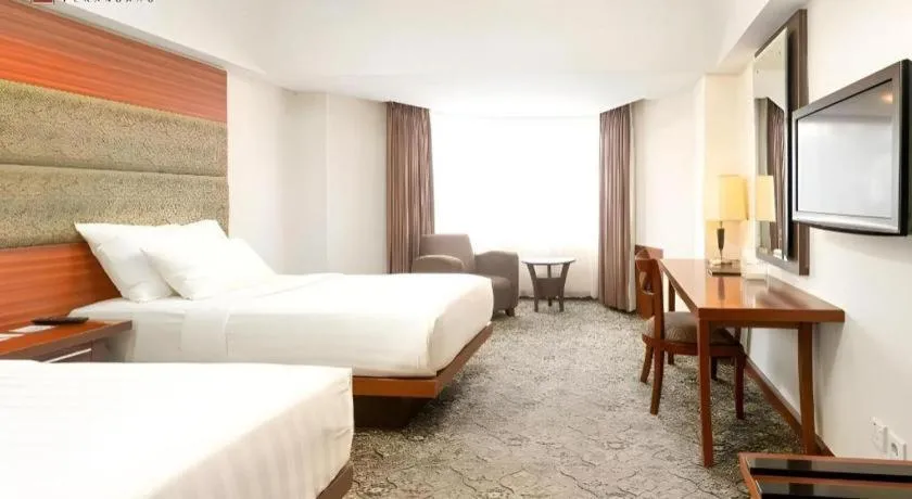 Bed in Hotel Pangeran