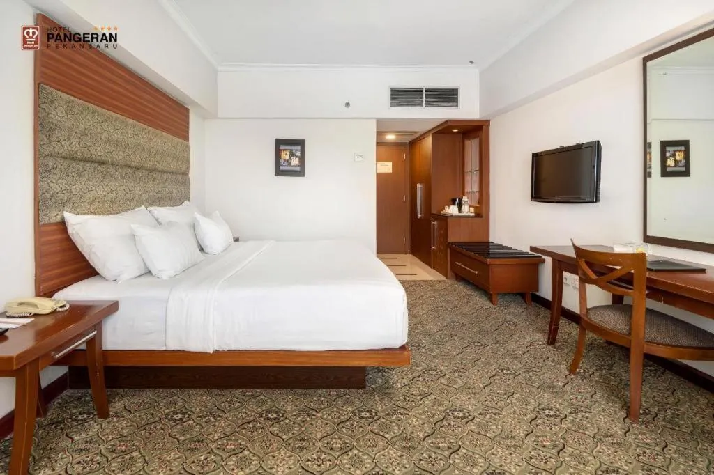 Bed in Hotel Pangeran