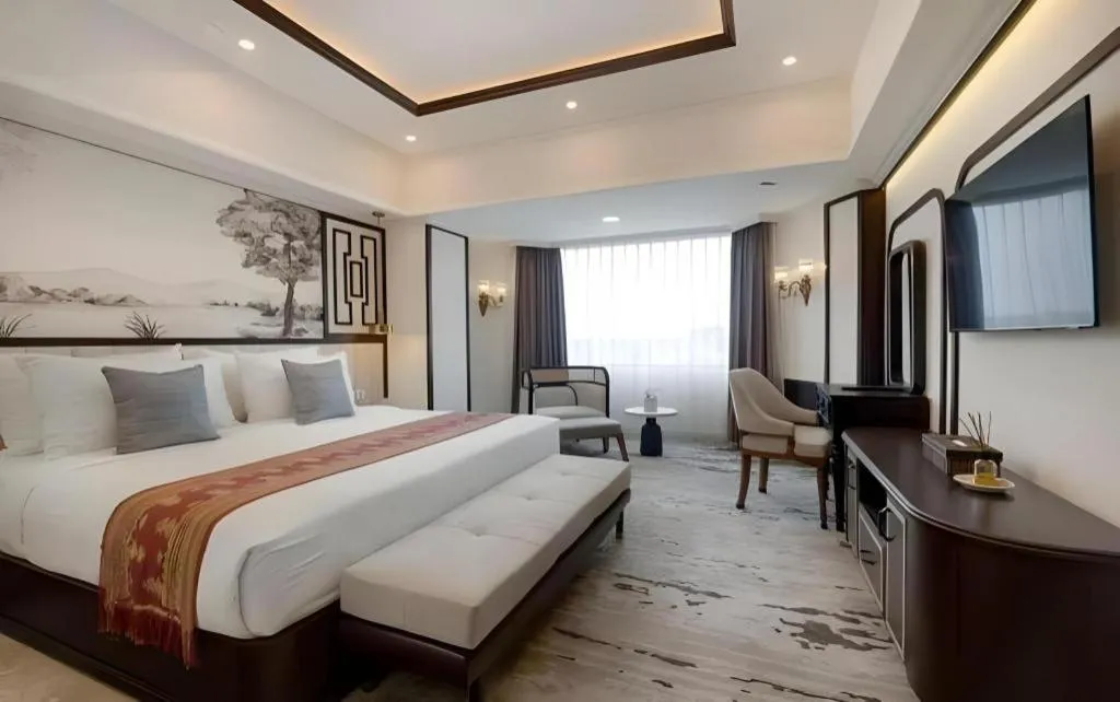 Bed in Hotel Pangeran