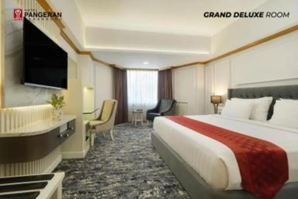 Bed in Hotel Pangeran
