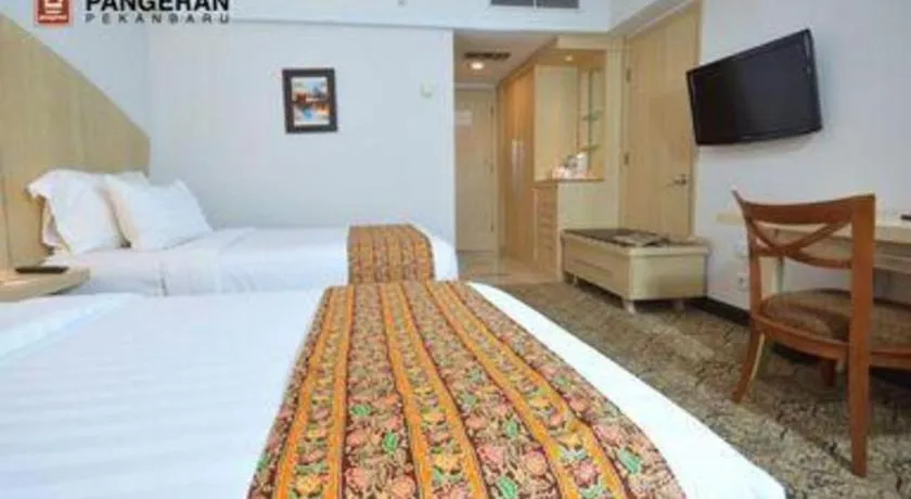Bed in Hotel Pangeran