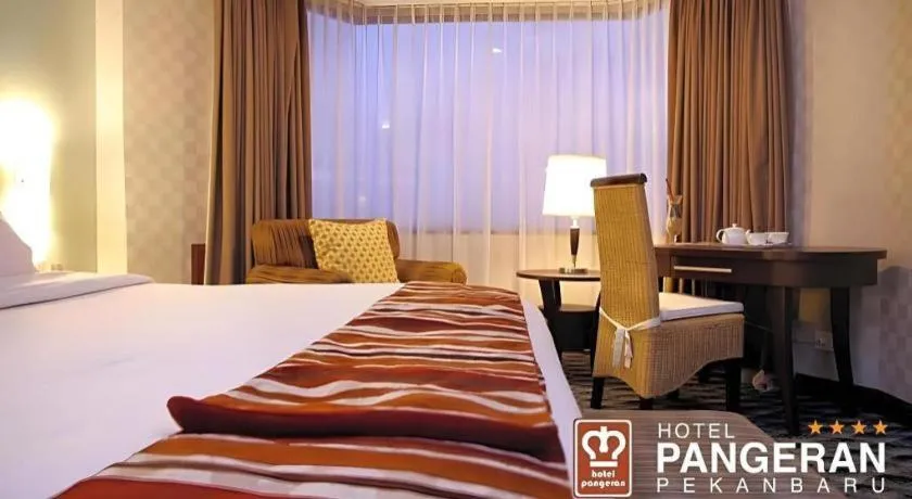 Bed in Hotel Pangeran