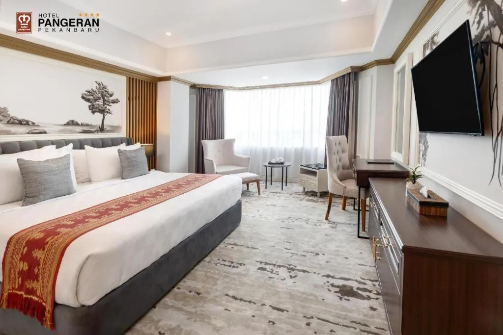 Bed in Hotel Pangeran