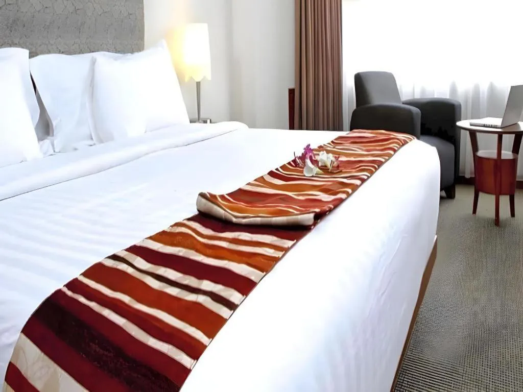 Bed in Hotel Pangeran