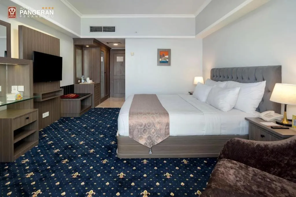 Bed in Hotel Pangeran