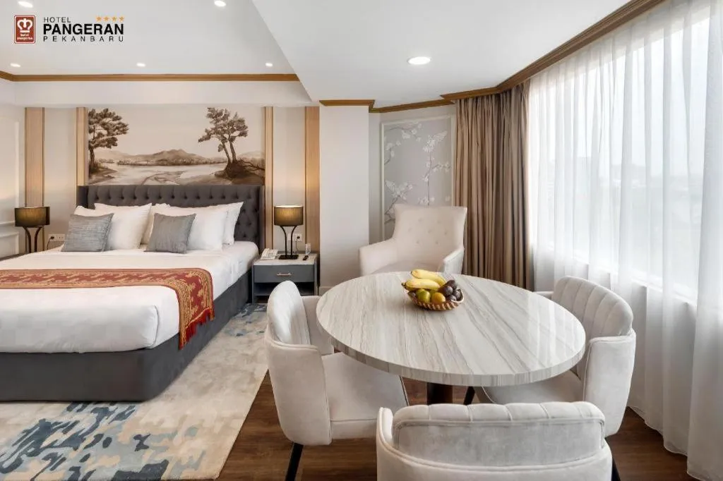 Bed in Hotel Pangeran