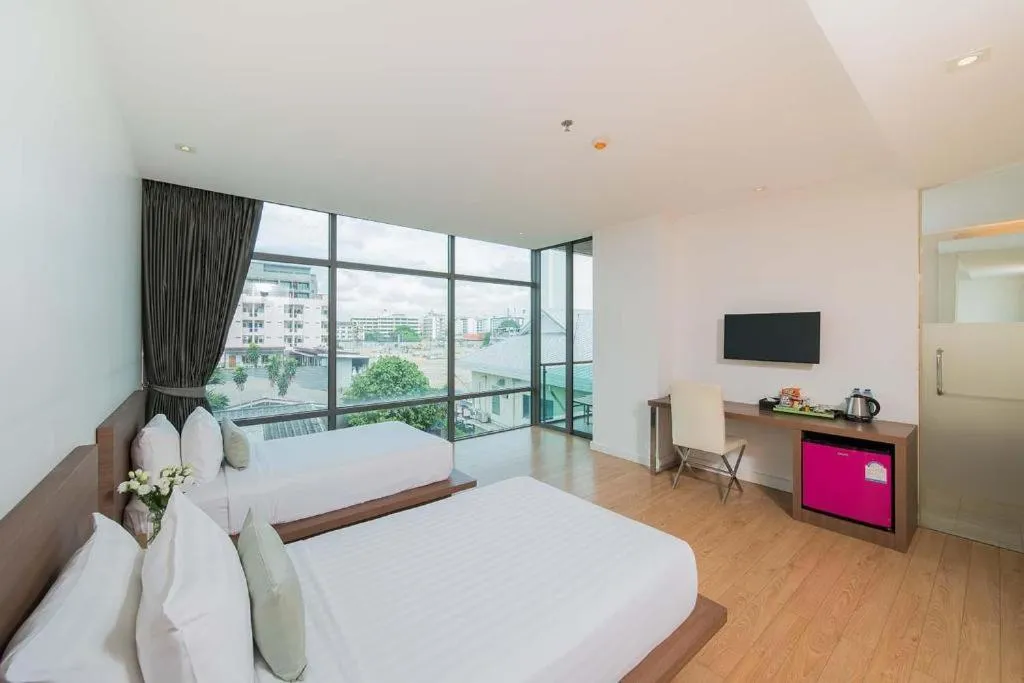 Bed in Seven Zea Chic Hotel