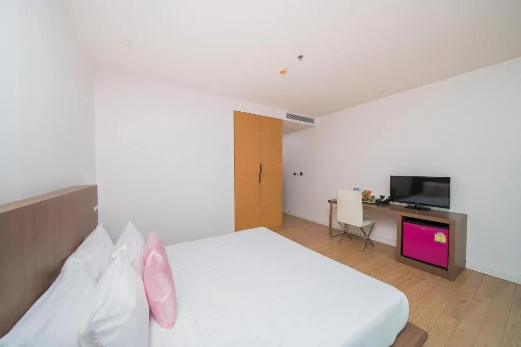 Bed in Seven Zea Chic Hotel