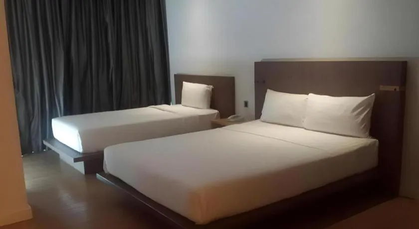 Bed in Seven Zea Chic Hotel