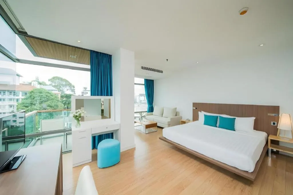 Bed in Seven Zea Chic Hotel