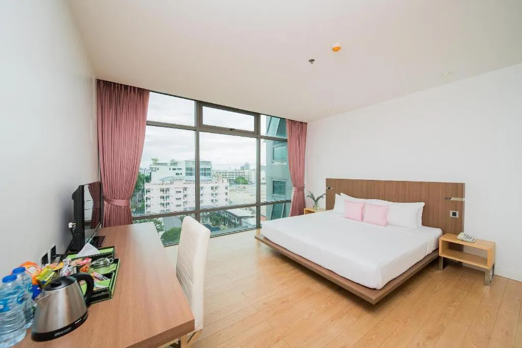 Bed in Seven Zea Chic Hotel