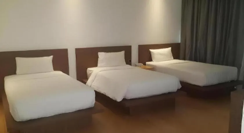 Bed in Seven Zea Chic Hotel