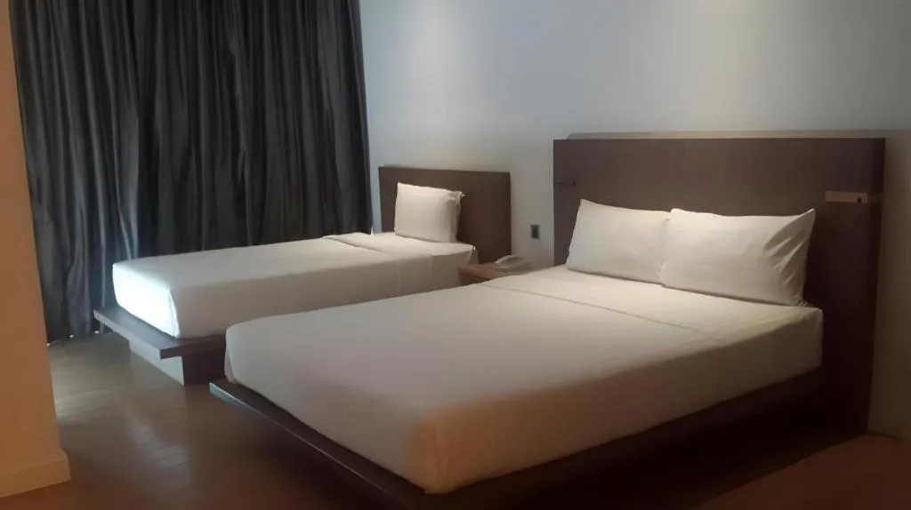 Bed in Seven Zea Chic Hotel