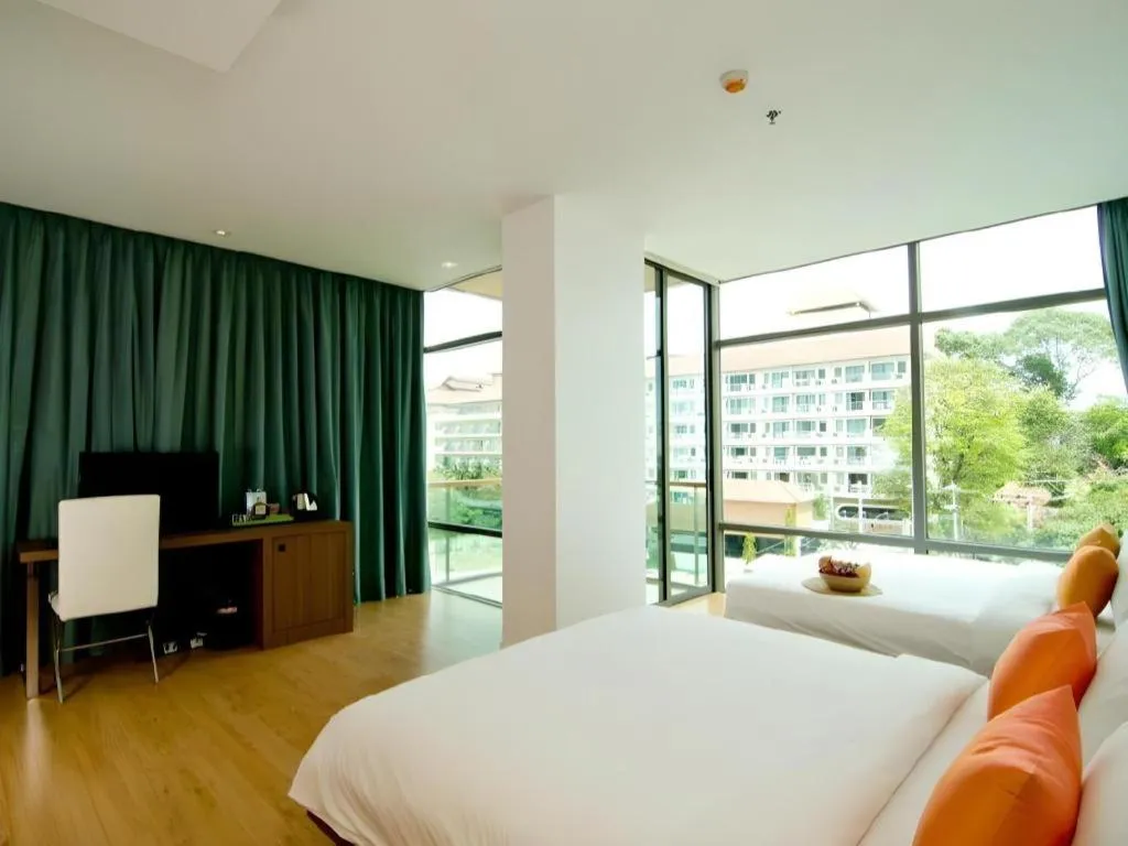 Bed in Seven Zea Chic Hotel