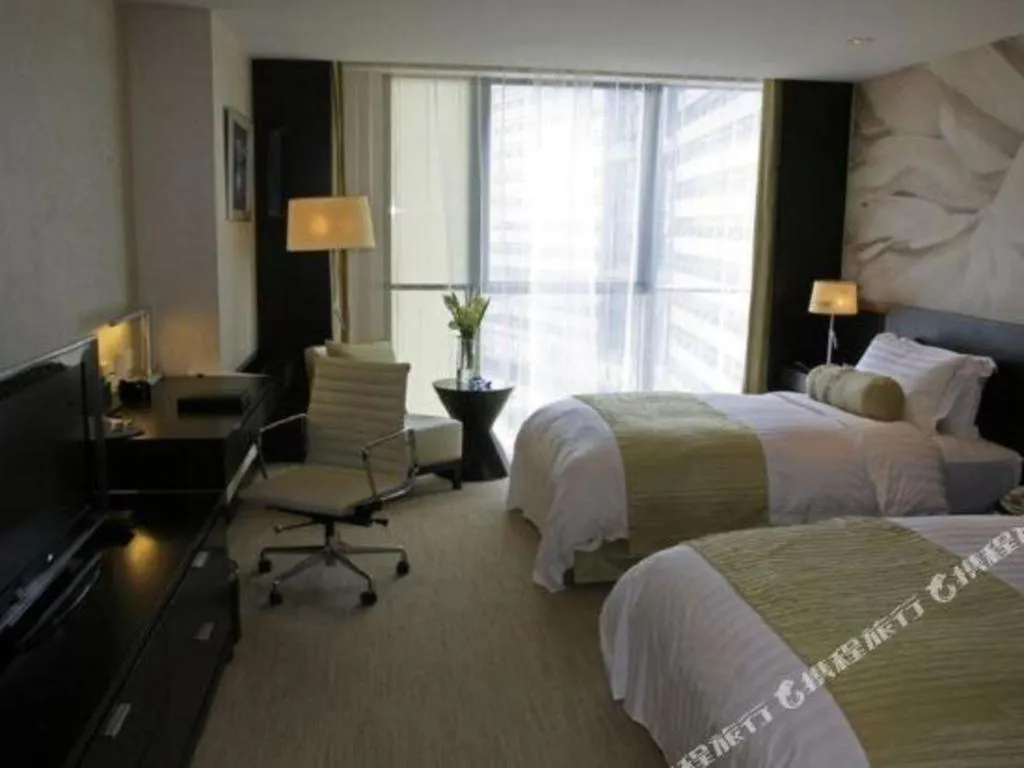 Bed in China National Convention Center Grand Hotel