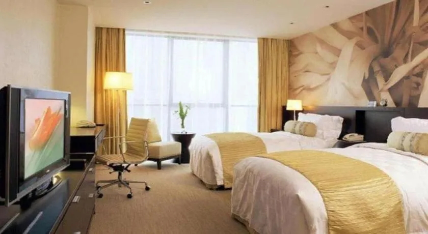 Bed in China National Convention Center Grand Hotel