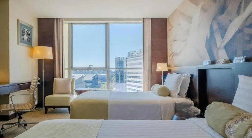 Bed in China National Convention Center Grand Hotel