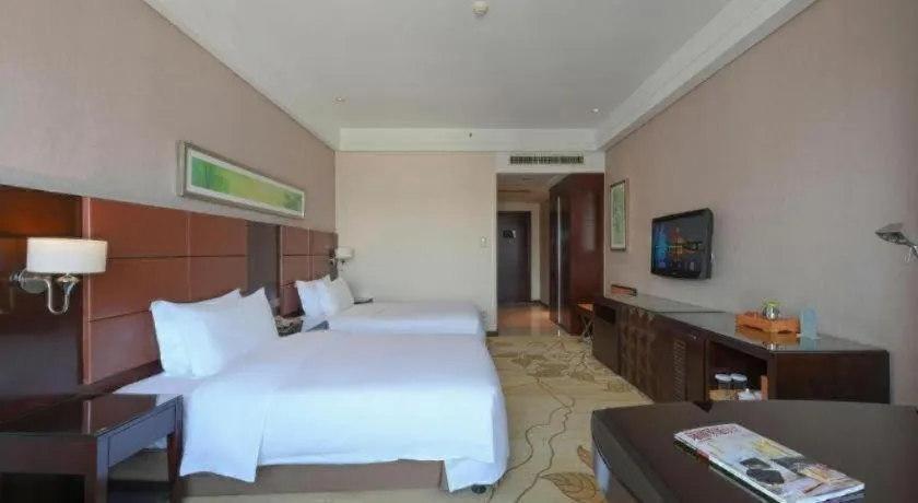 Bed in Kinho Narada Hotel