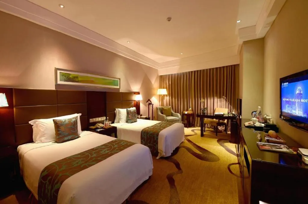 Bed in Kinho Narada Hotel