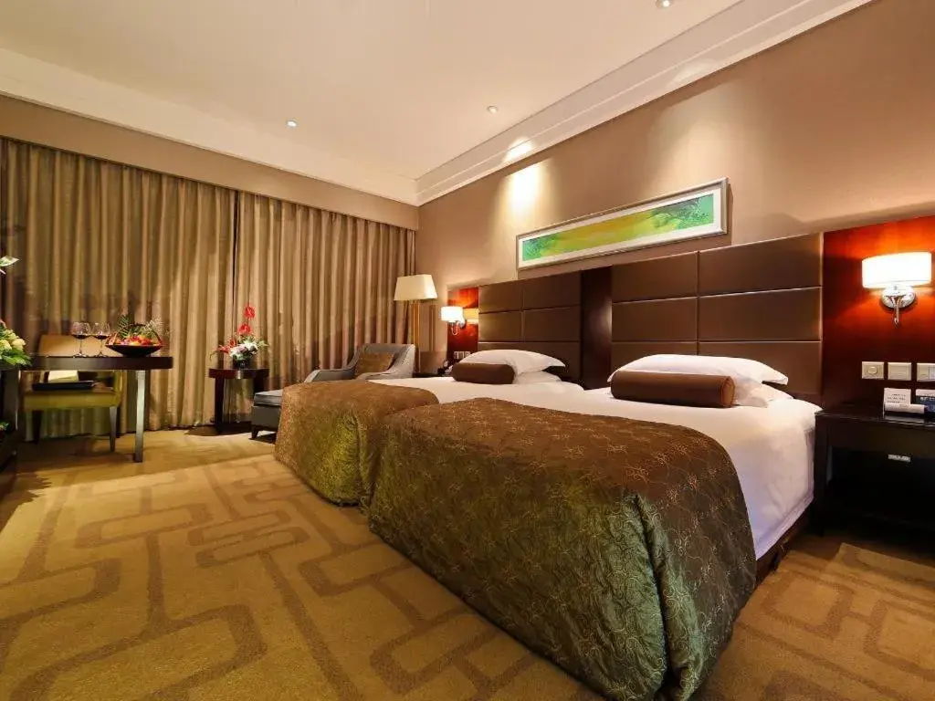 Bed in Kinho Narada Hotel Bed in Kinho Narada Hotel