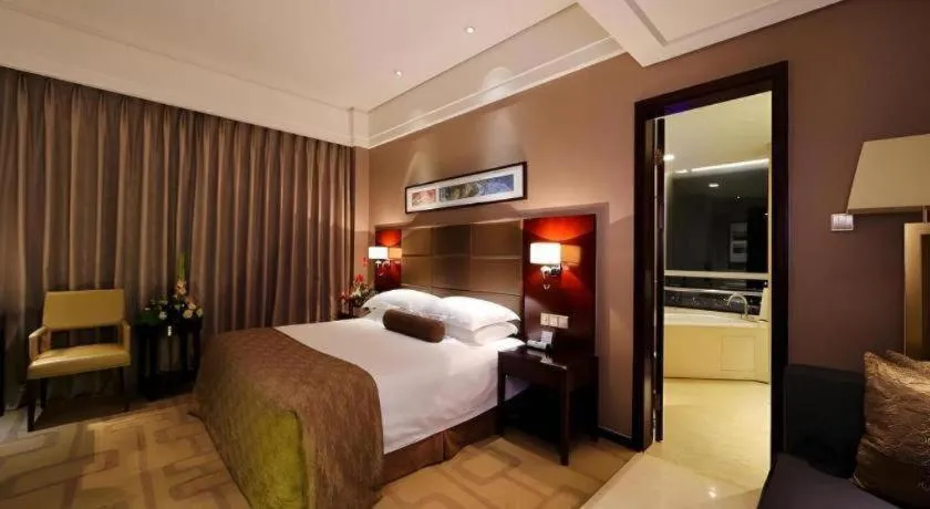 Bed in Kinho Narada Hotel