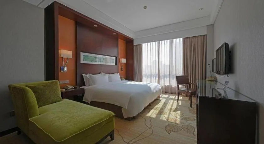 Bed in Kinho Narada Hotel