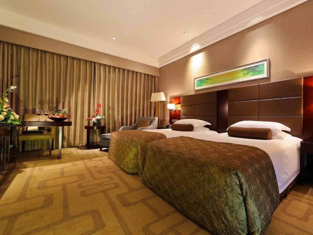 Bed in Kinho Narada Hotel