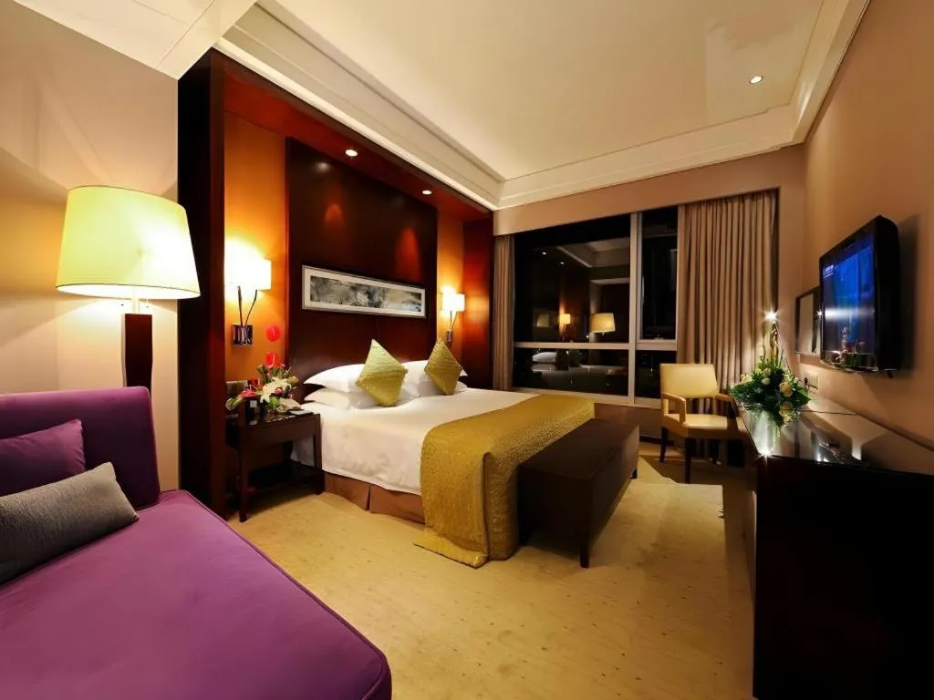 Bed in Kinho Narada Hotel