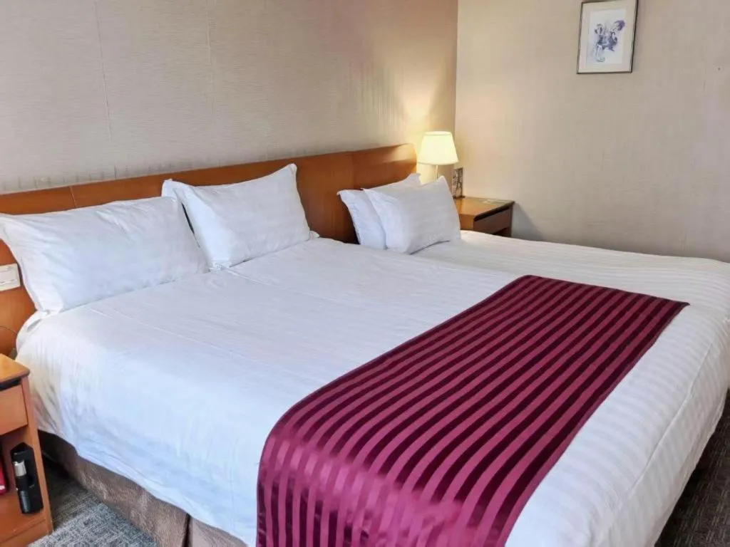 Bed in Jinglun Hotel