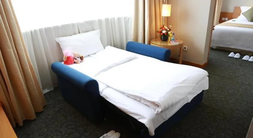 Bed in Jinglun Hotel