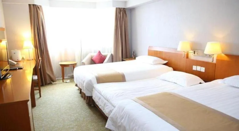 Bed in Jinglun Hotel
