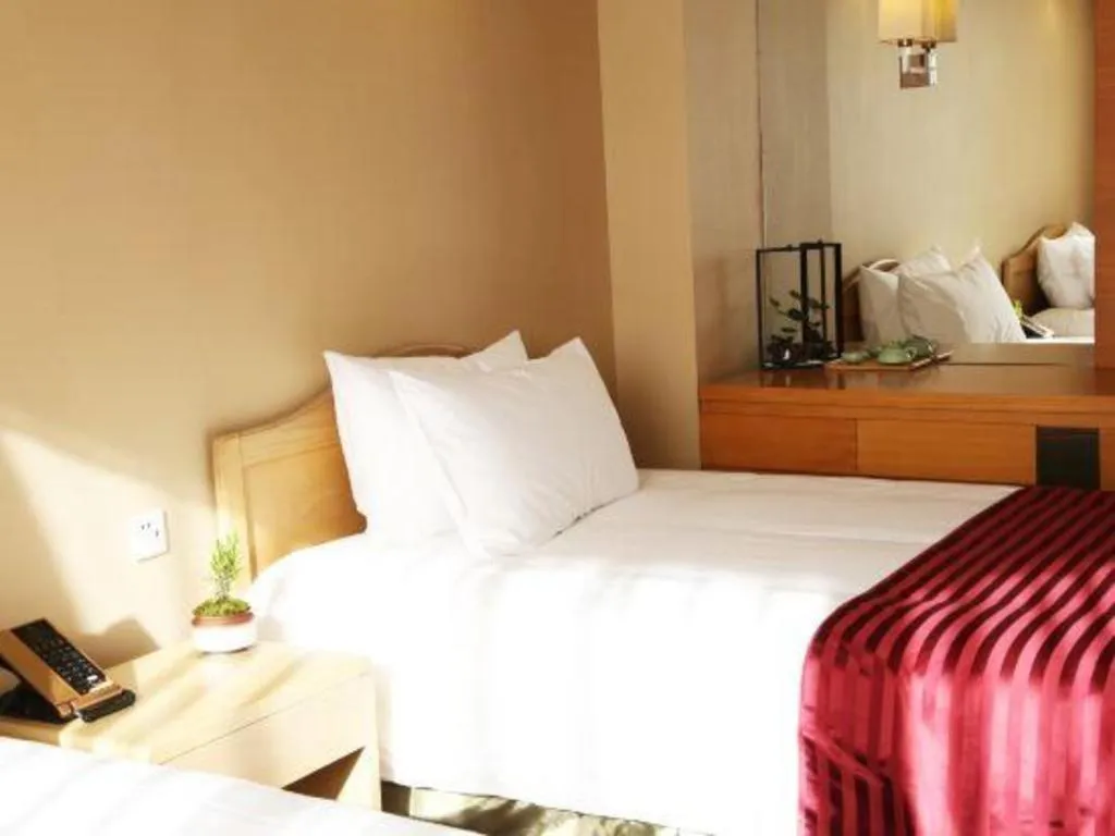 Bed in Jinglun Hotel