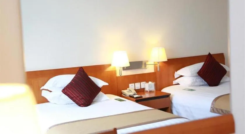 Bed in Jinglun Hotel