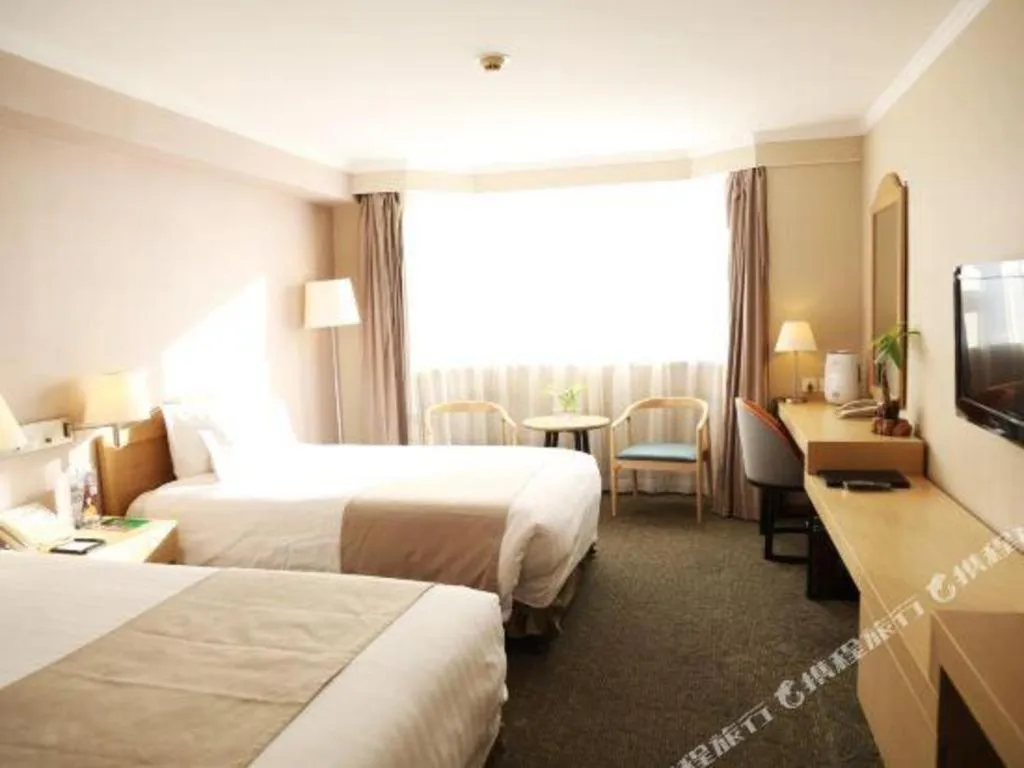 Bed in Jinglun Hotel