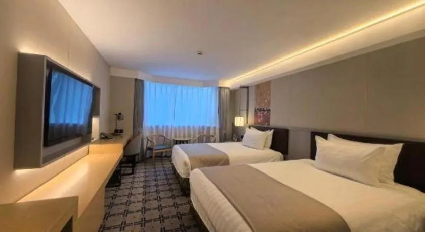 Bed in Jinglun Hotel