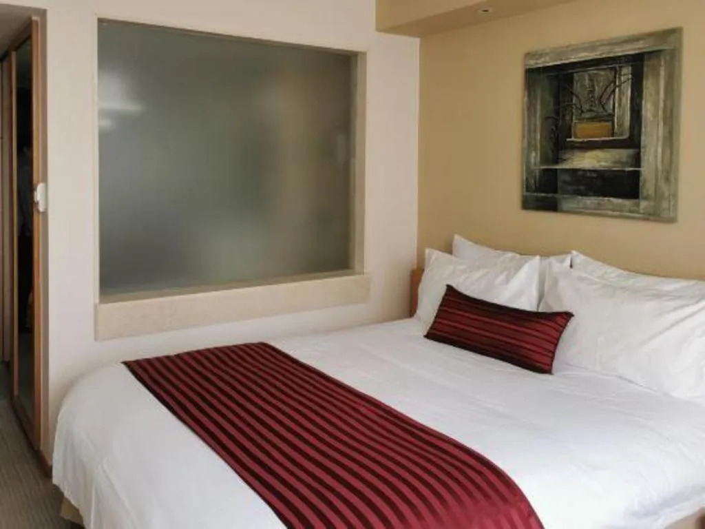 Bed in Jinglun Hotel