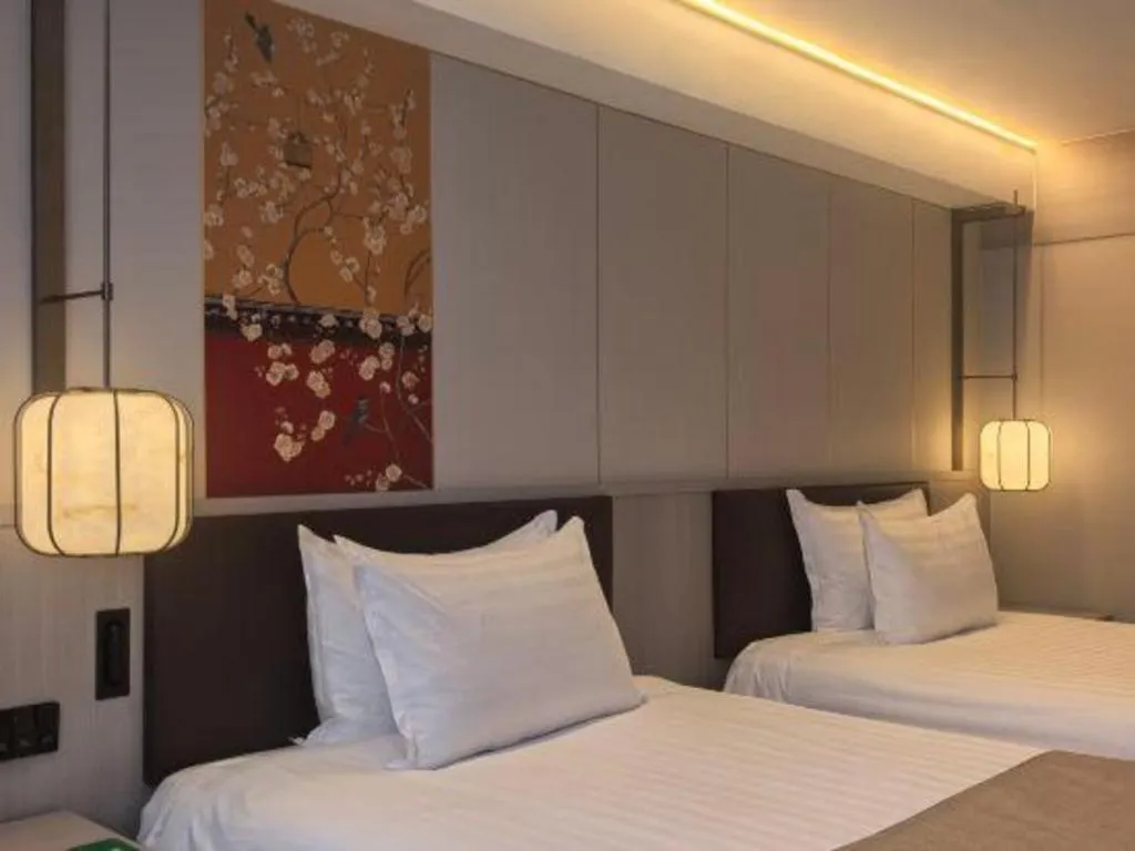 Bed in Jinglun Hotel