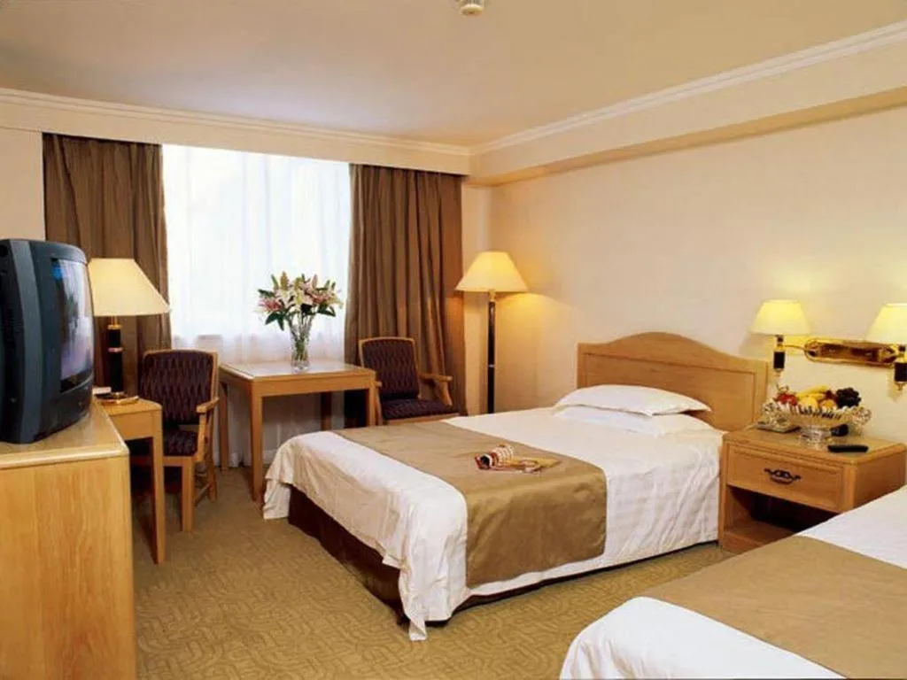 Bed in Jinglun Hotel