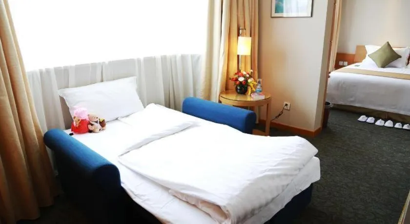 Bed in Jinglun Hotel