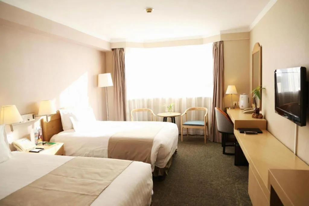 Bed in Jinglun Hotel