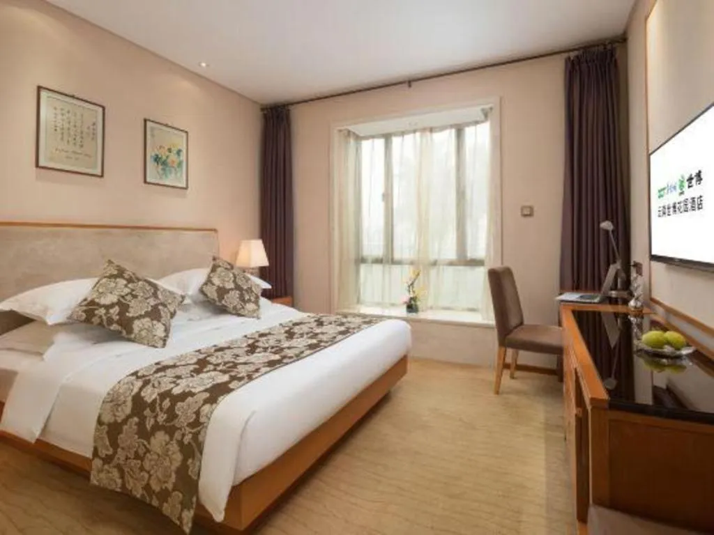 Bed in Expo Garden Hotel