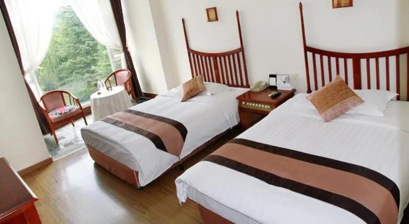 Bed in Expo Garden Hotel