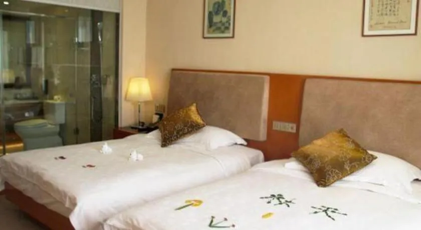 Bed in Expo Garden Hotel