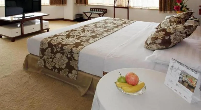 Bed in Expo Garden Hotel