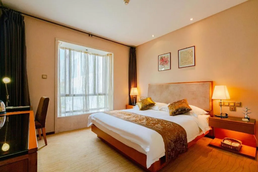 Bed in Expo Garden Hotel