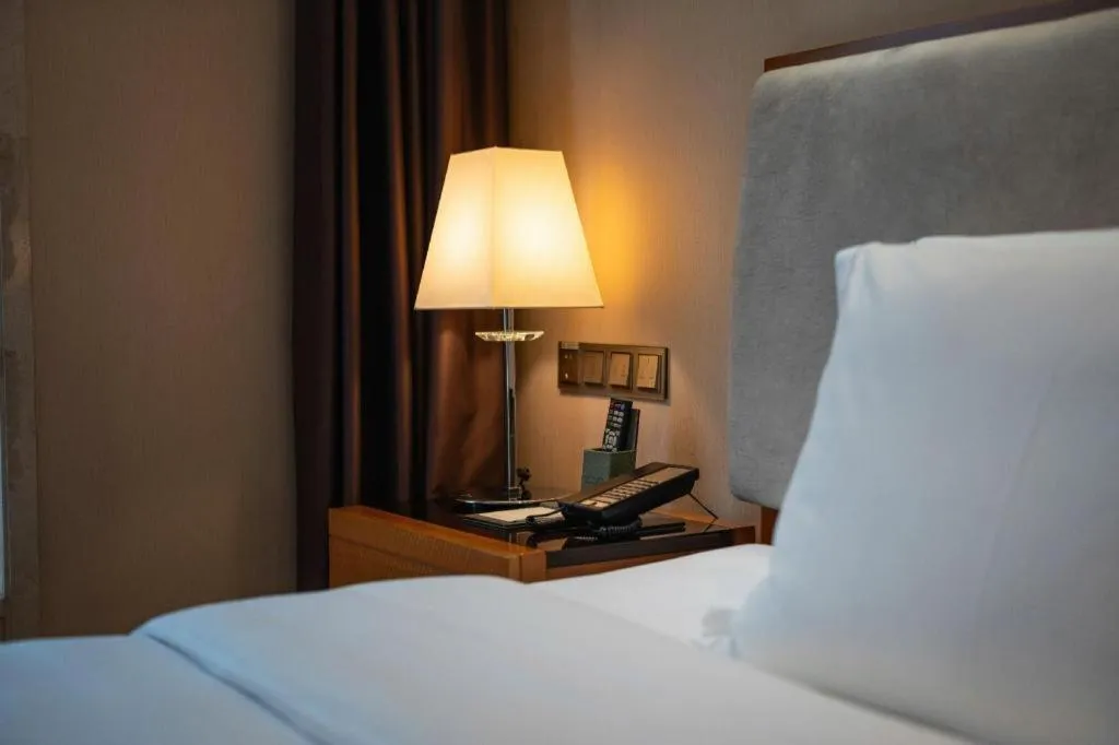 Bed in Expo Garden Hotel