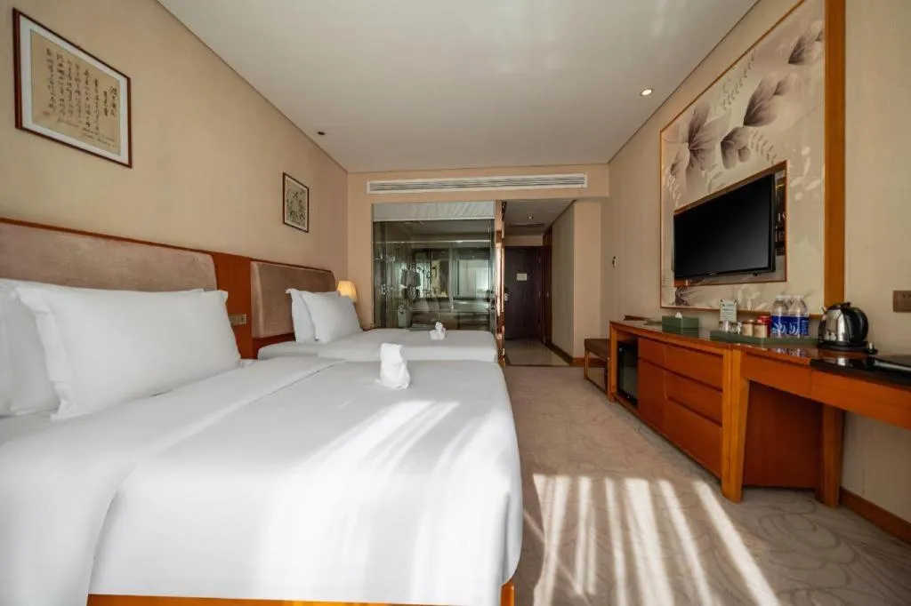 Bed in Expo Garden Hotel