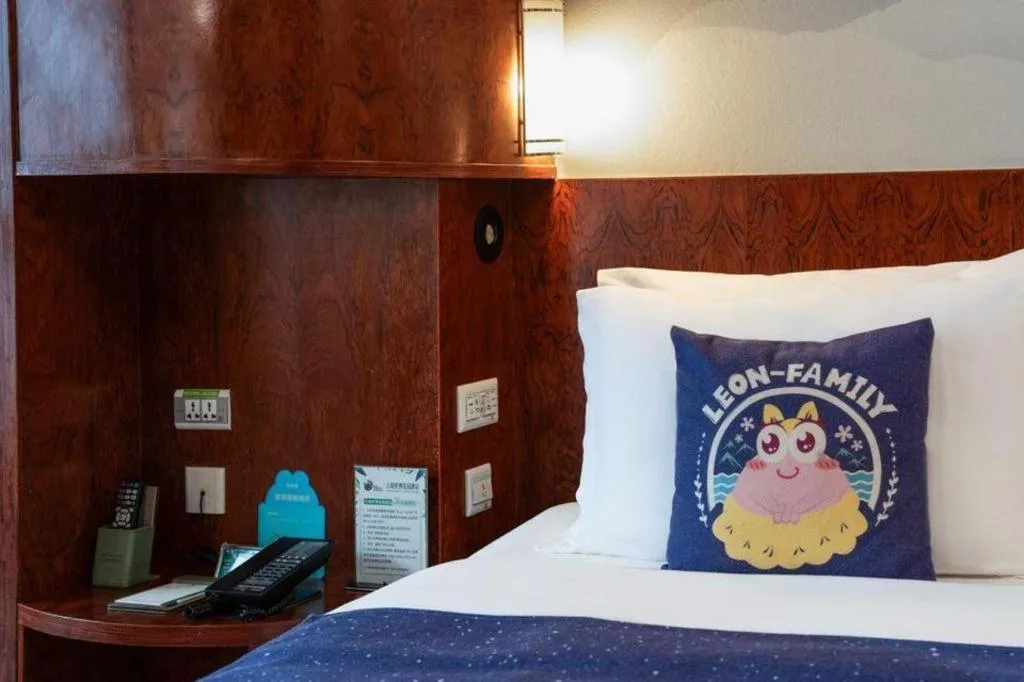 Bed in Expo Garden Hotel