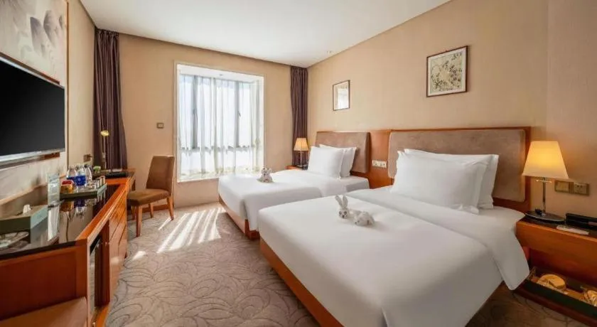 Bed in Expo Garden Hotel