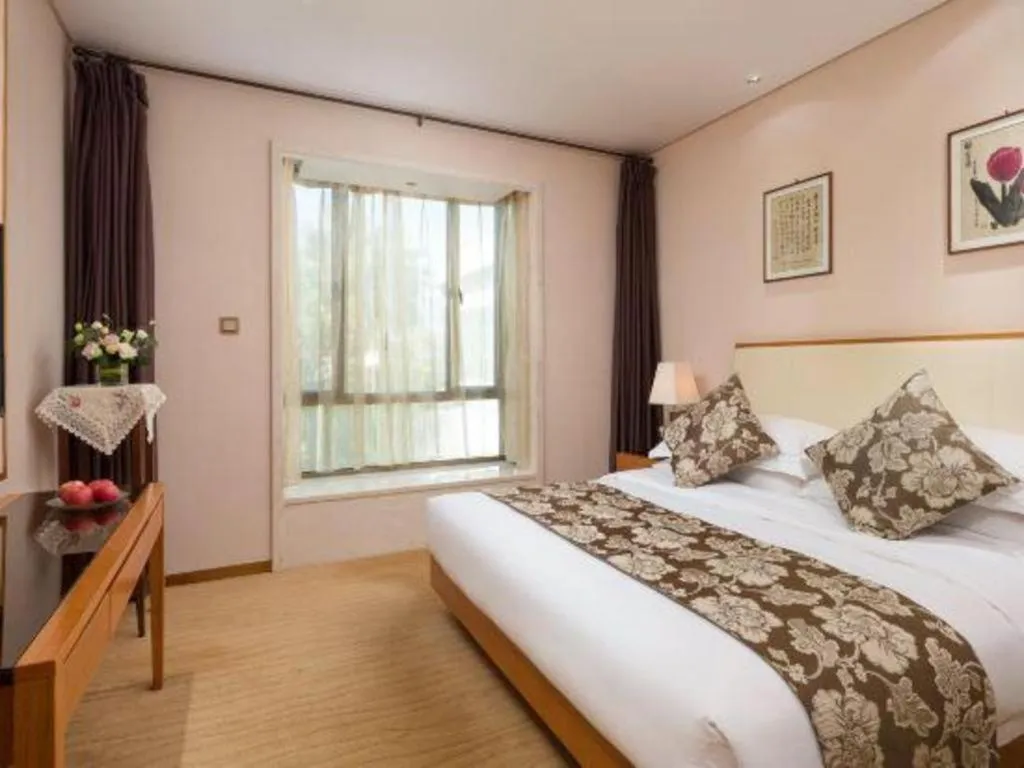 Bed in Expo Garden Hotel